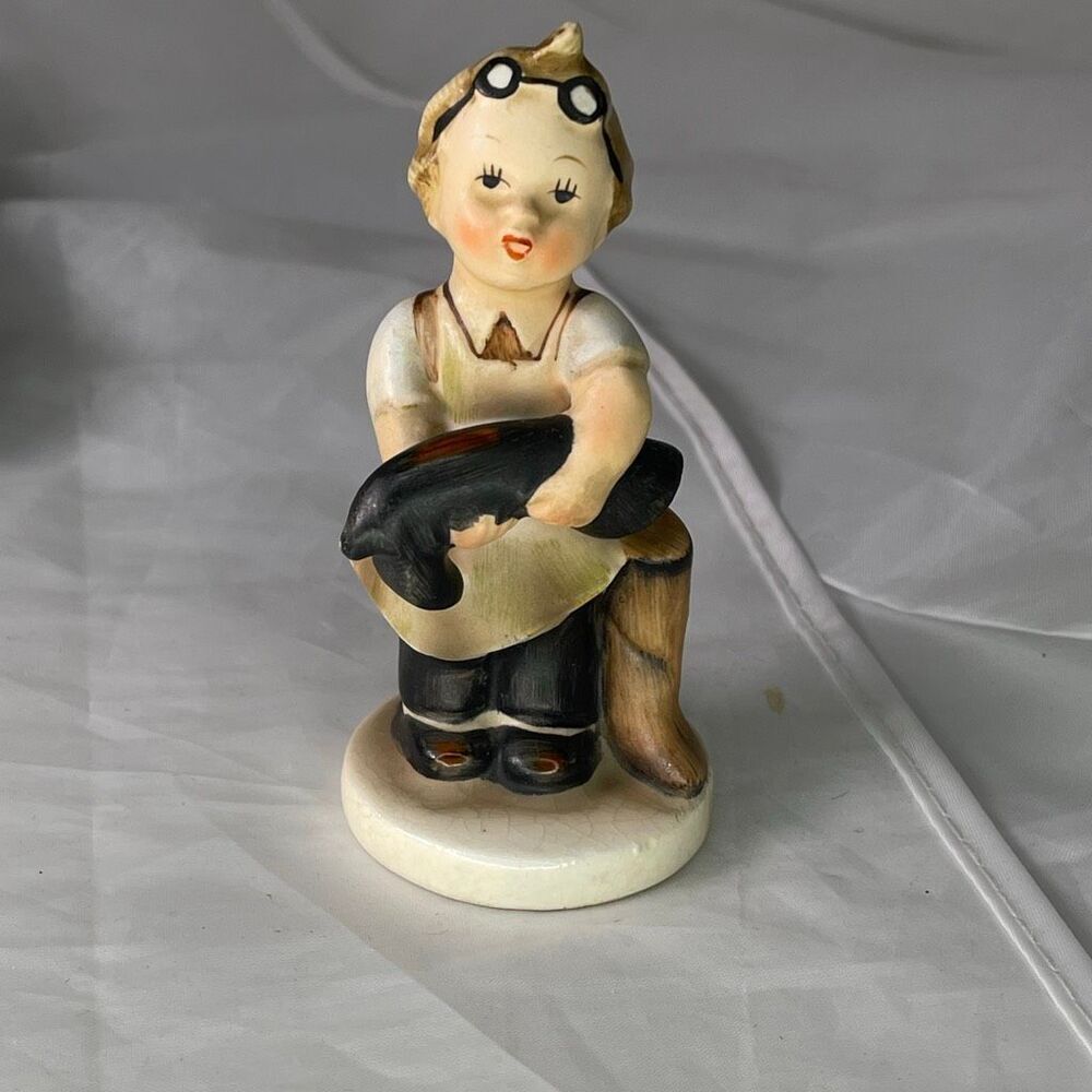 Midcentury “Boots” NAPCO cobbler boy ceramic figurine.